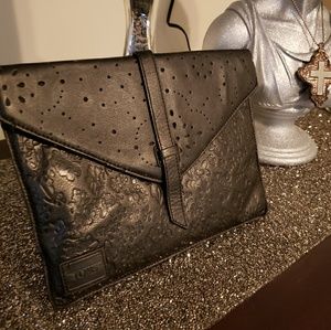 Tom's Embossed leather clutch black